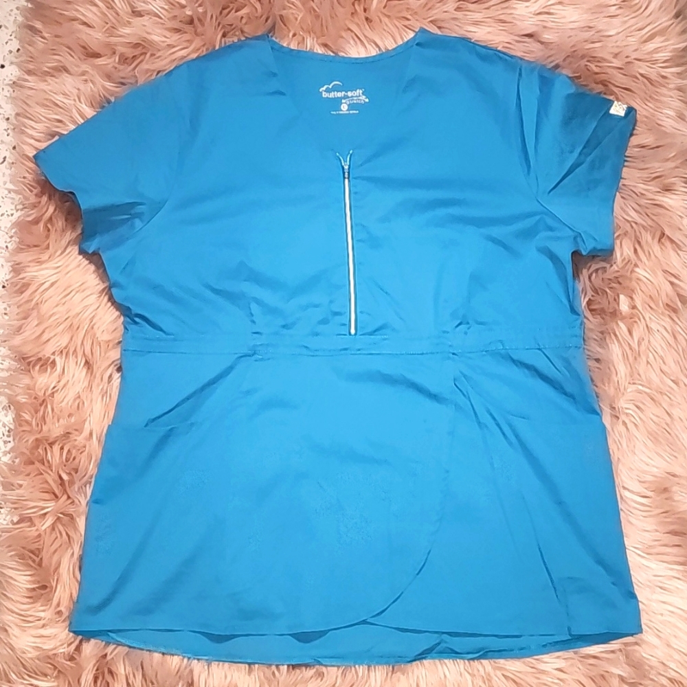 Butter-soft peplum style scrub top